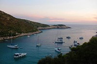 Nice shot from the hill above the Porat bay, beach restaurant Kod Jakse