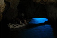 Ilirio's tours to Blue cave - underwater bridge and boat full of visitors