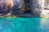 Croatia, tour to three caves - stony seascape shapes