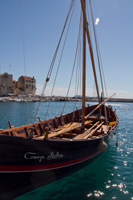 Ilirio's Hvar tours: Traditional wooden boat Falkusa in Komiza port