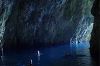 Ilirio's tours - Monk seal cave - calm sea water and swimmers