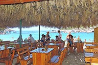 Simple bench seatings at beach restaurant Kod Jakse, Porat bay, Bisevo island