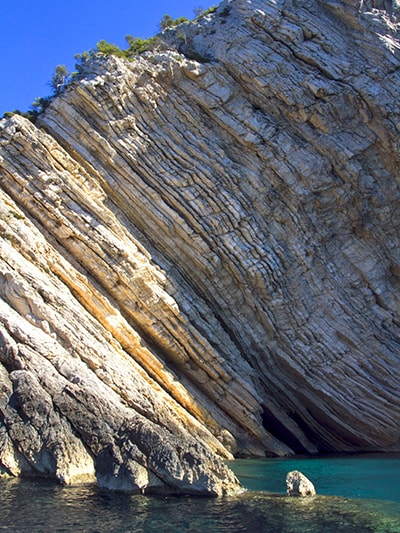 Under the cliffs of Bisevo - Ilirio's Three Caves Tour starting from Split
