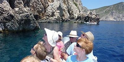 Guests sightseeing incredible Bisevo rock formation - Ilirio's Hvar Tours
