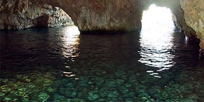 Silver green color of Green Cave at Ravnik island, Ilirio's Three Caves Tour starting from Split